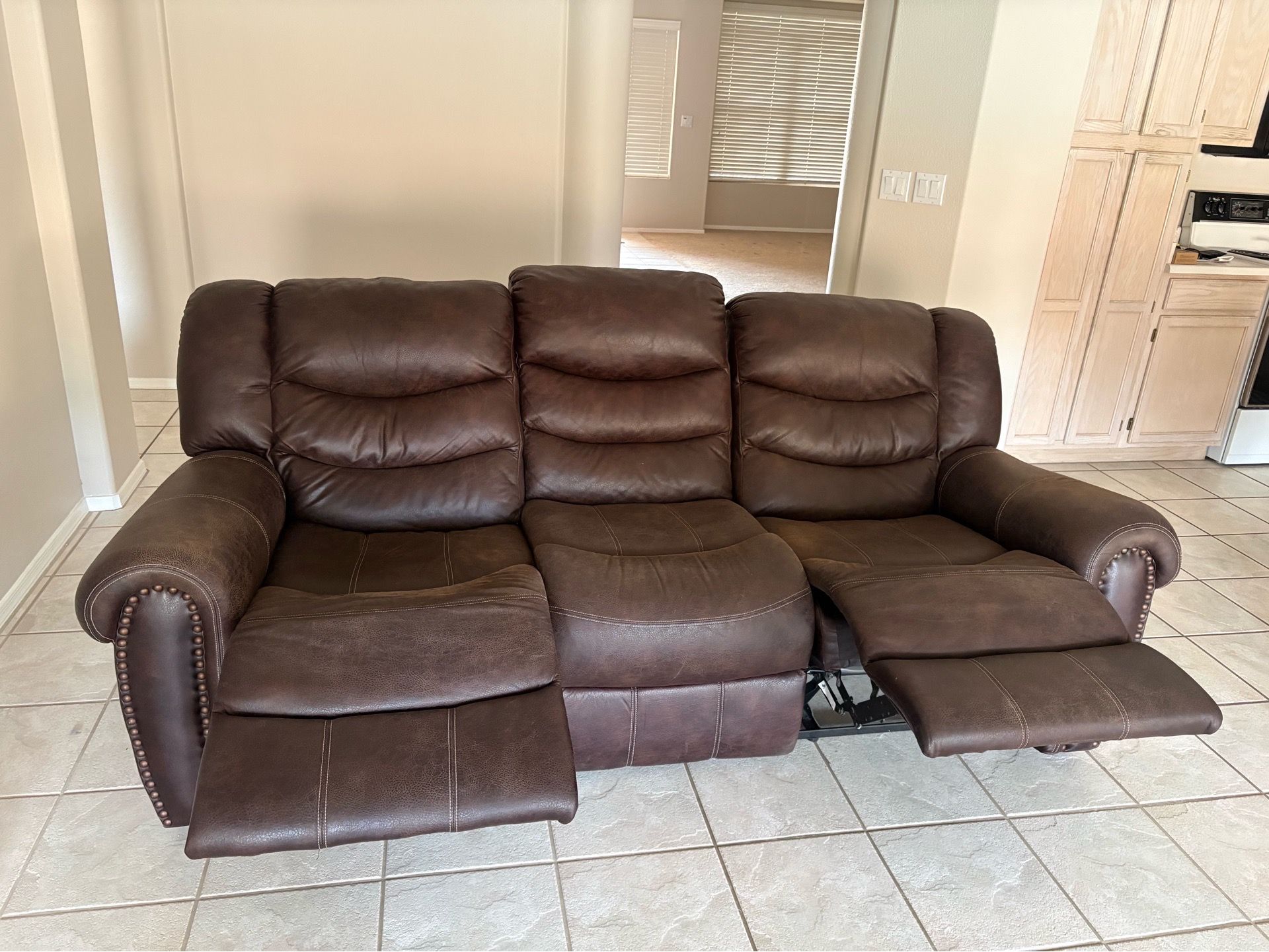 Brown Faux Leather Couch - Manual Recliner