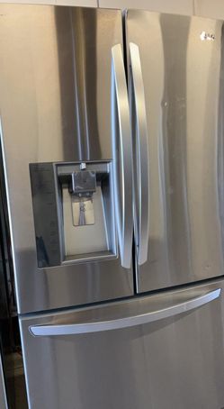 LG 3 Door Stainless Steel Refrigerator 33" Wide With Water and Ice maker
