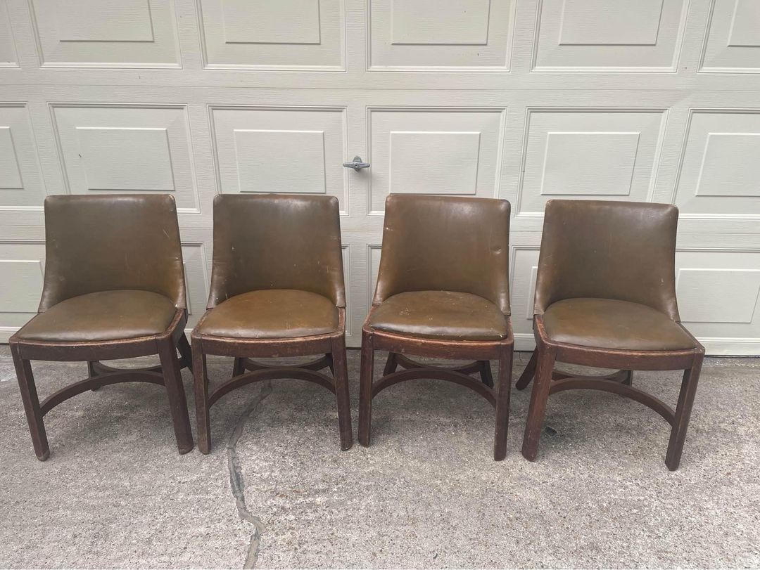 Four Vintage Wood And Leather Chairs