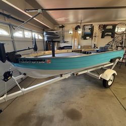 Mirro Craft 12 ft aluminum boat w/ 14 hp electric start
