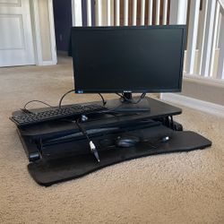 Computer Riser, Samsung Monitor, New Dell Keyboard, Mouse. 