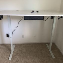 Brand New Height-adjustable electric table.