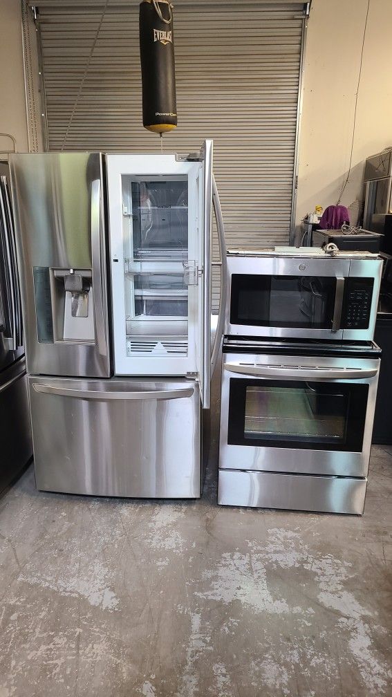 Refrigerator Lg With Fast Door, Stove Electric And Microwave In Stainless Steel Combo Delevery