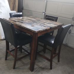 Dining Table And Chairs 