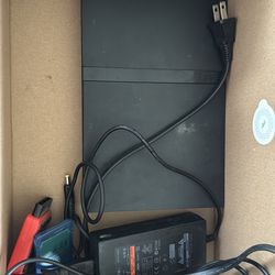 PlayStation 2 Slim + Accessories and Games