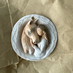 Girl and horse ornament