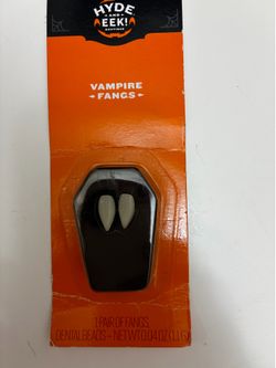 Vampire fangs, new still in packaging