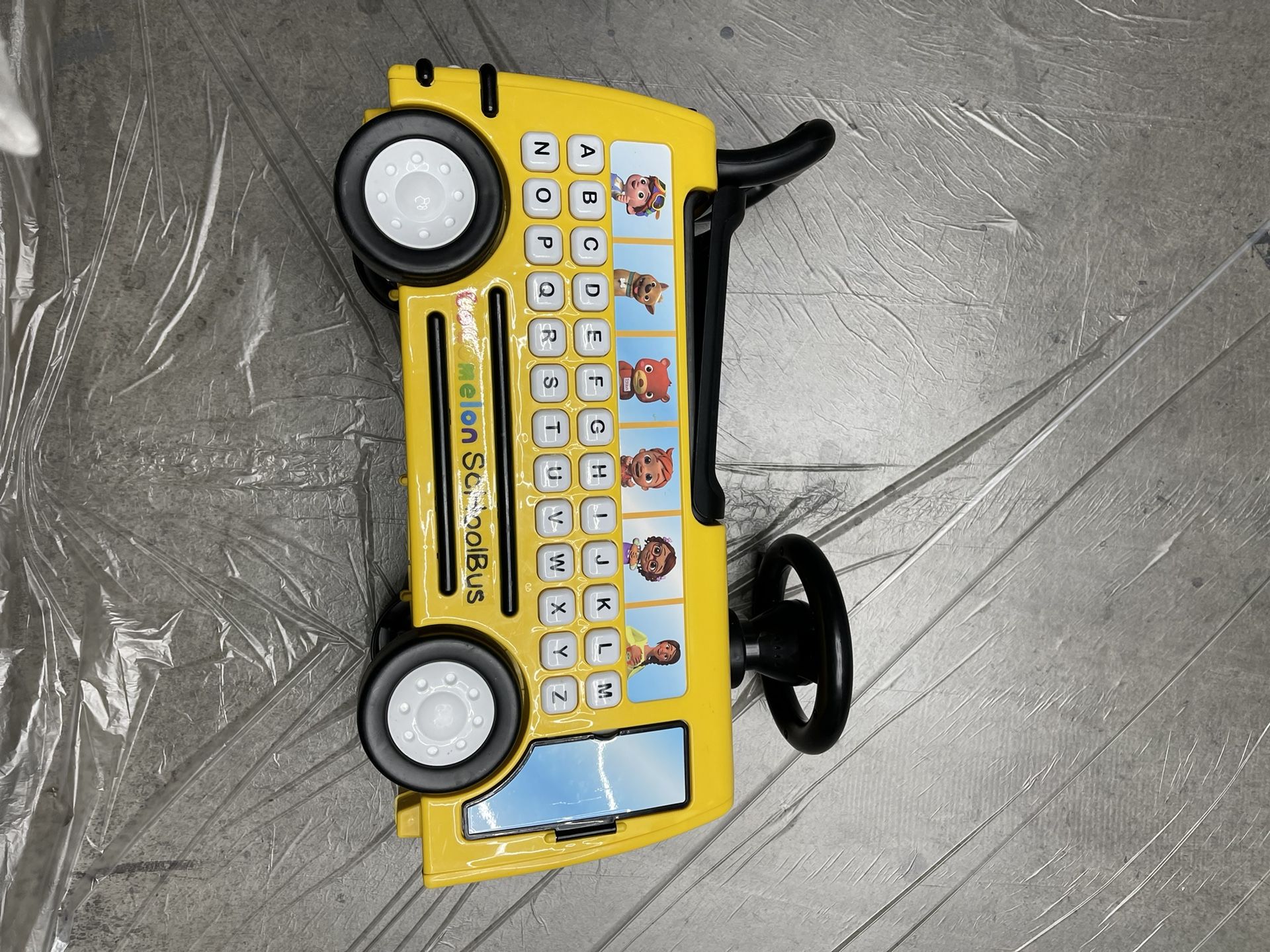 CoComelon School Bus Ride-on with Letters, Numbers, & Music