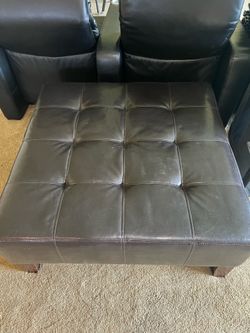 Faux leather ottoman