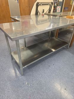 Stainless steel surgical/exam tables