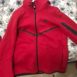 Red Nike teck size medium