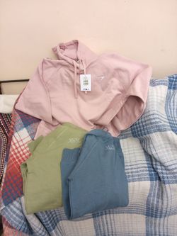 crescent hoodies.. pastel pink blue and green