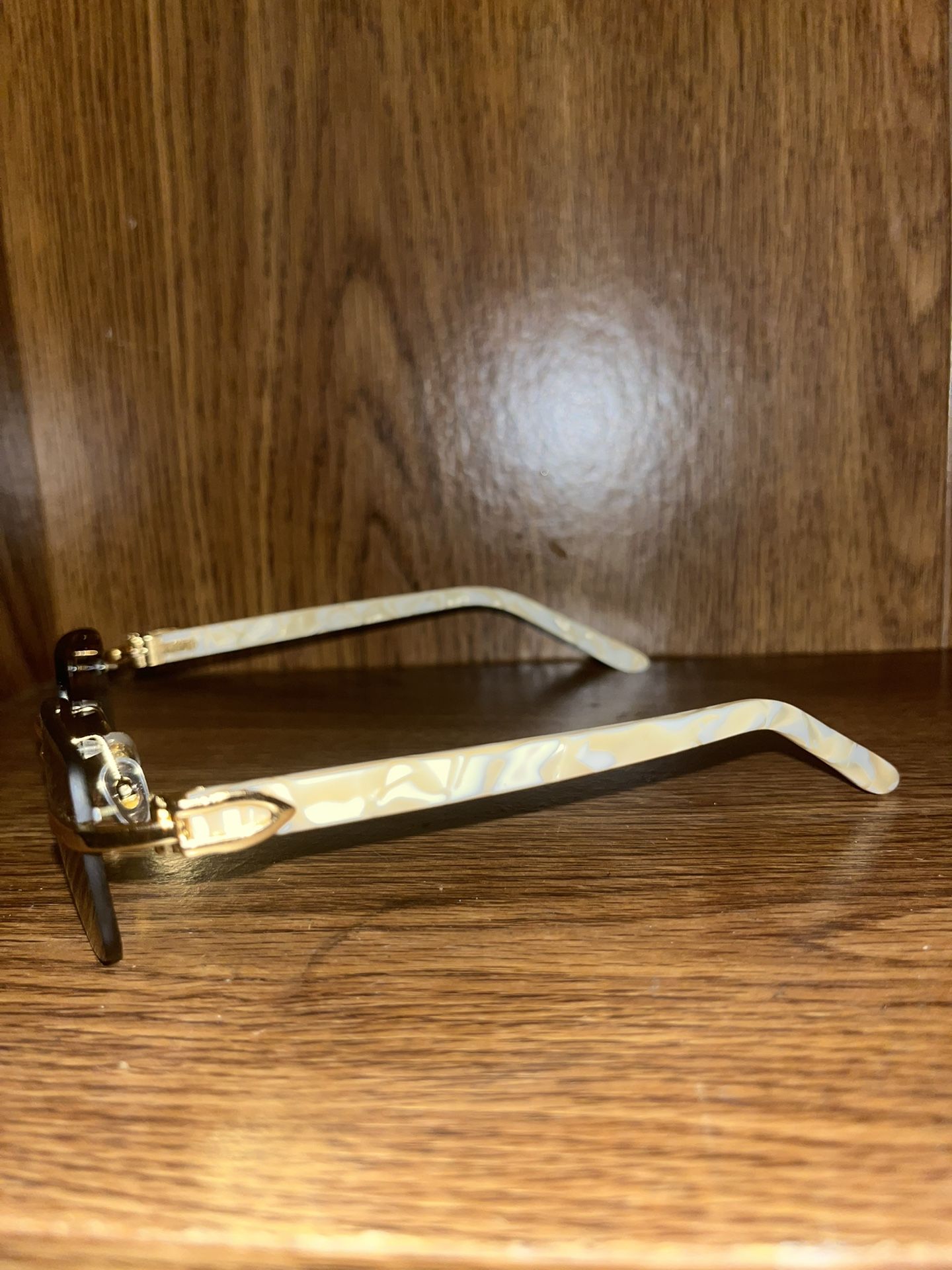 Cartier Brown And White Buffs