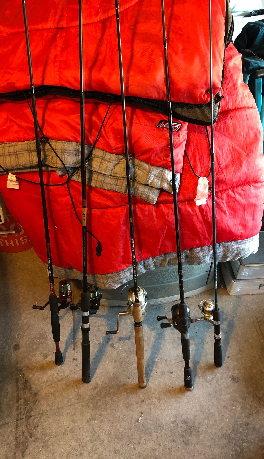 4 fishing rods and reels