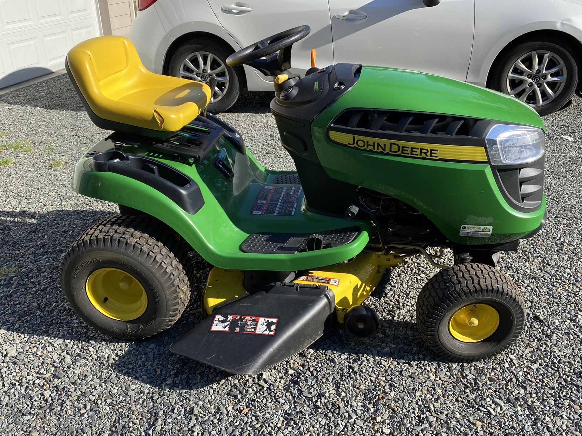 John Deere D110 42” deck riding lawn mower