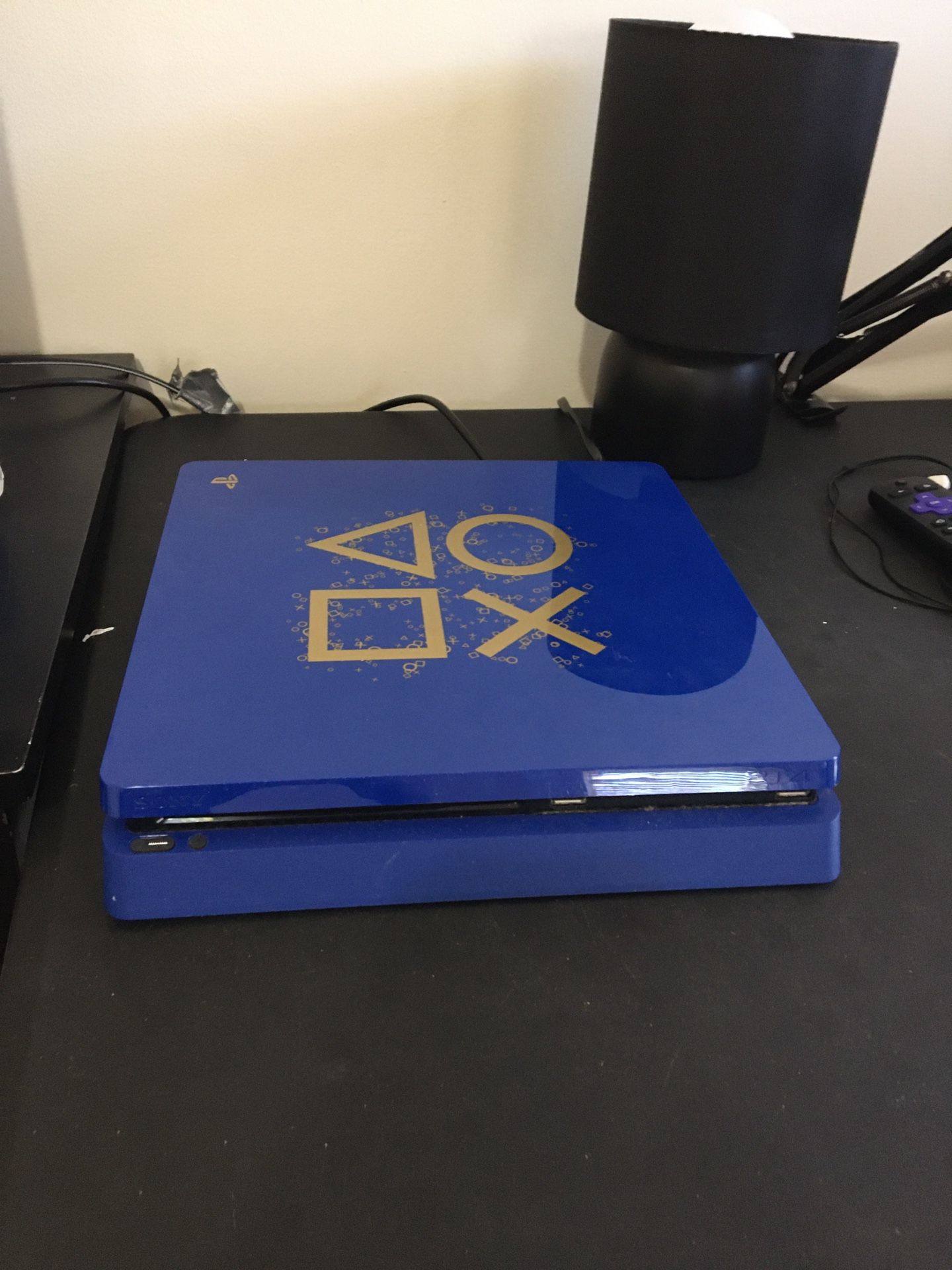 Blue ps4 with controller