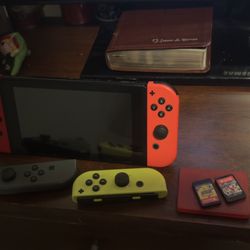 Nintendo Switch With Extra Controllers And Game 