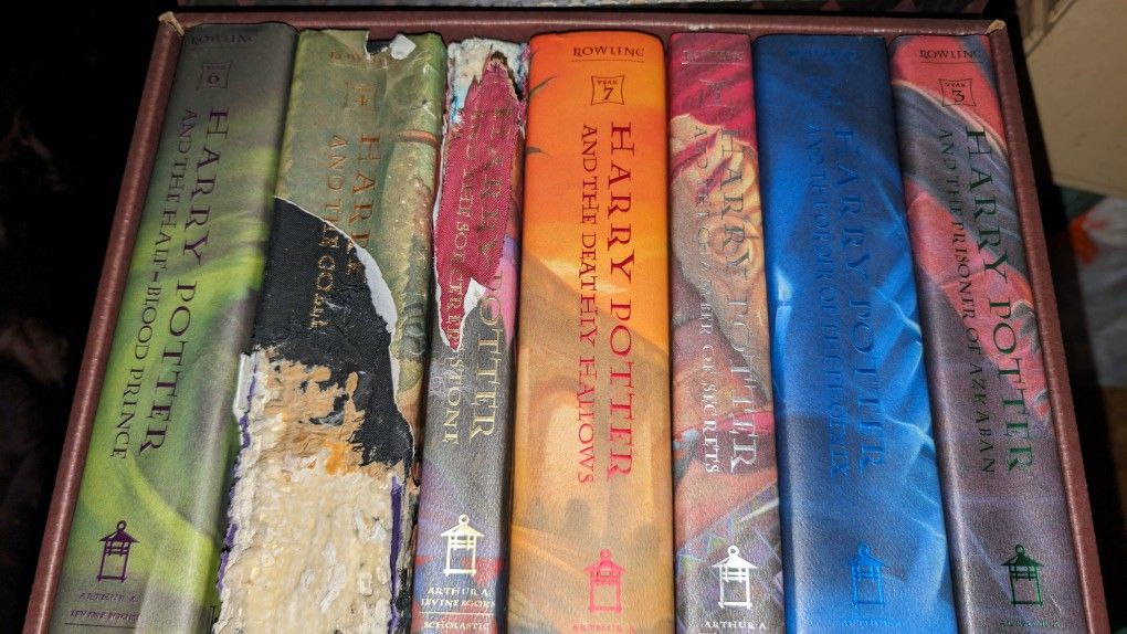 Complete Set Of Hardback Harry Potter Books By J.K. Rowling About Hogwarts School. These don't look read, but a few have damage, mainly last 3, name w