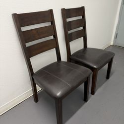 2 Black Leather Chairs 