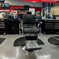 Barbershop chair black and white hydraulic pump