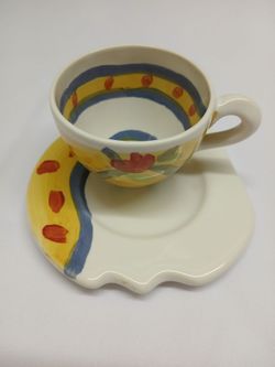 BRAND NEW CUP AND SAUCER UNUSUAL SAUCER FRONT