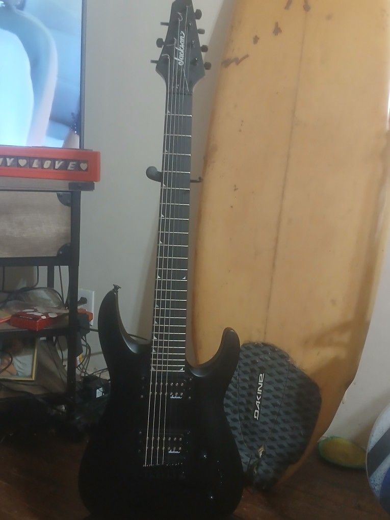Jackson 7 String Guitar With Stand And Cable