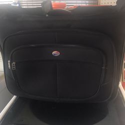 American tourist rolling suitcase