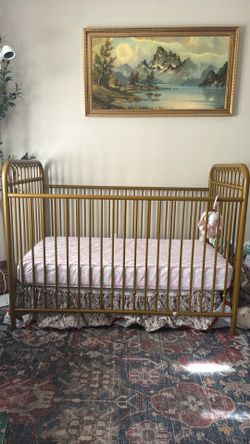 Gold crib with waterproof mattress