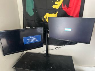 Two monitors that are connected