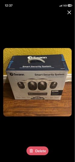 Swann security system 4 Camera New In Box. No Police Access.