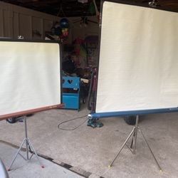 Two Old Vintage Projector Screens 
