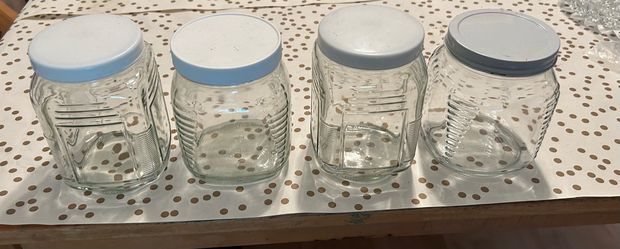 Four Jars with Lids