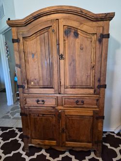 Rustic Pine Wood Armoire with Iron Hardware