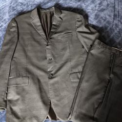Burberry Plaid suit 
Black and dark grey