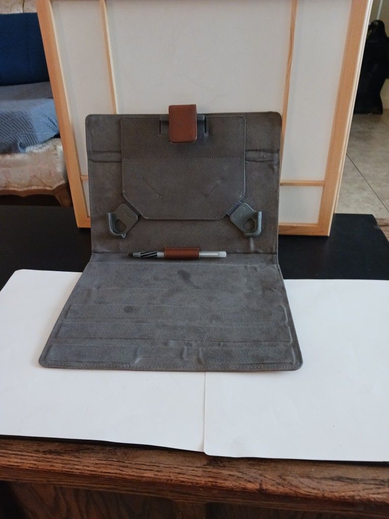 Notebook Cover Faux Brown Leather and Faux grey Suade Inside.