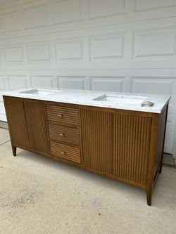 New Double sink vanity with backsplash. Make me an offer