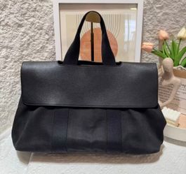 Hermès cowhide and canvas medium-sized bag