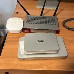 Assorted Network hardware - Cisco Moral And Eero Pod Plus ZyXel Router 