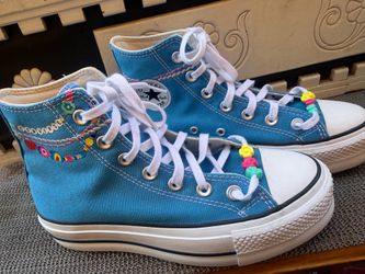 Converse Chuck Taylor All Star Lift High Top sneakers in a "Dial Up Blue" colorway, featuring embroidered bracelet details on the collar.size 6