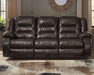 New Leather Reclining Sofa By Ashley
