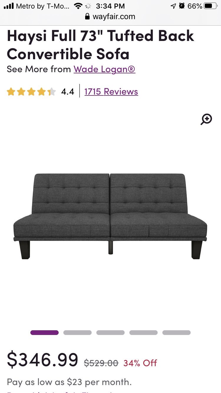 Dark gray futon - Very Unique Feature can be turned and used as a chaise lounge.