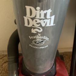 Dirt Devil bagless upright vacuum, red