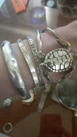 Sterling silver except the turtle.