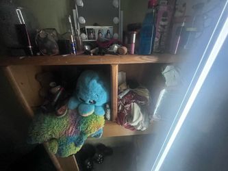 Twin bed has four draws for clothes a little extra space in the little two door thing the back bored is the too spaces a lot of space for wtv you want