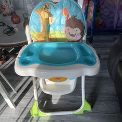 Baby High Chair - adjustable with plastic backing and removable tray