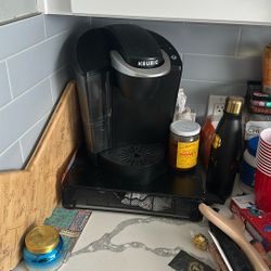 Lightly Used Keurig and the pod Holder 