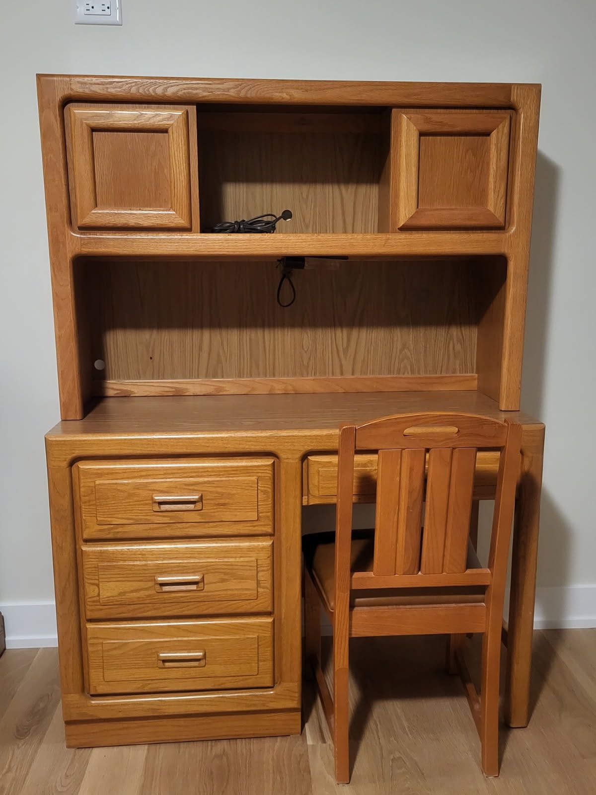 Desk, Hutch And Chair In Great Shape. Desk 44" wide x 18" deep x 30" tall. Hutch that sits on top of desk 44" wide x 12" deep x 30" tall