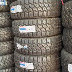 33X12.5020 SET OF 4 MUD TIRES WITH INSTALLATION AND BALANCING 