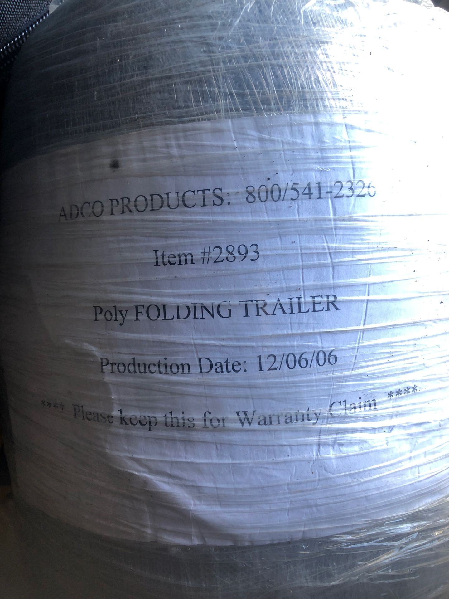 Poly folding trailer cover. Never opened