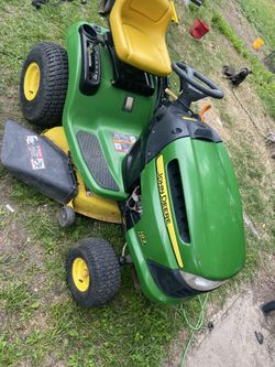 John Deere riding lawn mower
